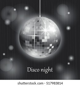 a stylized image of disco ball on a dark background with light