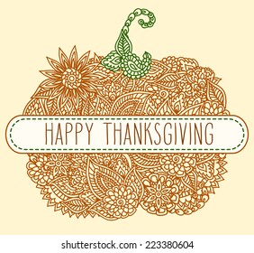 Stylized lacy doodle pumpkin with hand drawn word 'Thanksgiving' over it.