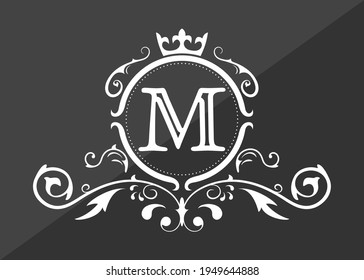 Stylized letter M of the Latin alphabet. Monogram template with ornament and crown for design of ials, business cards, logos, emblems and heraldry. Vector illustration