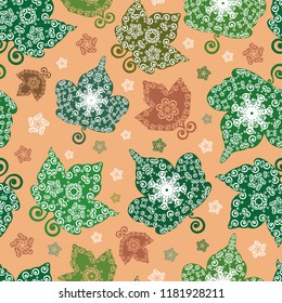 Stylized maple leaves seamless vector pattern background. Decorated green and brown foliage on orange backdrop. Hand drawn ornamental folk art style design with stencil effect. All over print for fall