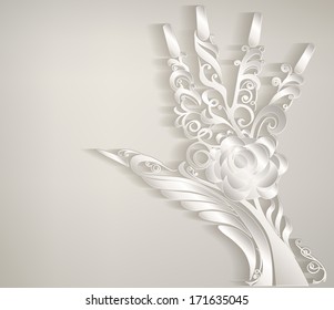 Stylized palm. Hand carved white patterned paper.