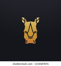 Stylized rhino head icon illustration. Vector glyph, tribal rhinoceros animal design with golden color