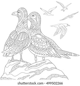 Stylized seagulls, flock of marine birds. Freehand sketch for adult anti stress coloring book page with doodle and zentangle elements.