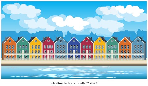 Stylized seamless horizontal vector illustration on the theme of the town and colorful townhouses