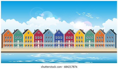 Stylized seamless horizontal vector illustration on the theme of the town and colorful townhouses