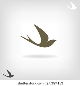 Stylized silhouette swallow. Logo design for company.