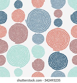 Stylized texture with arcs and circles. Seamless pattern. Warm colors. Hand drawn beads. Round elements. Colorful background for decoration or printing on fabric. Simple backdrop for pattern fills.