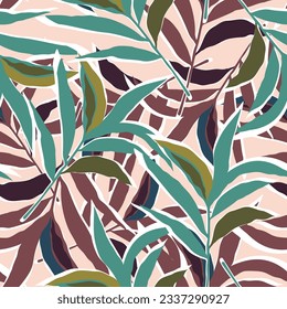 Stylized tropical palm leaves wallpaper. Jungle palm leaf seamless pattern. Design for fabric, textile print, wrapping, cover. Fashion vector illustration