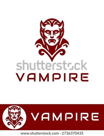 Stylized vampire logo design featuring a menacing face with fangs and sharp details