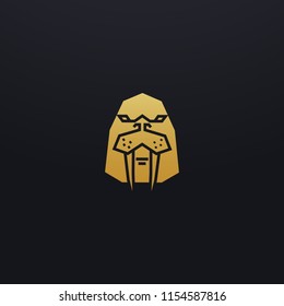 Stylized walrus head icon illustration. Vector glyph, tribal animal design with golden color