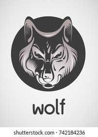 Stylized Wolf head in vector. Works well as a tattoo, icon, emblem, print or mascot. Circle composition