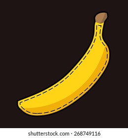 stylized yellow banana with shadow on a black background 
