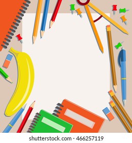 Subjects are laid out on a table with an empty surface for writing. Back to school