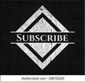 Subscribe chalkboard emblem on black board
