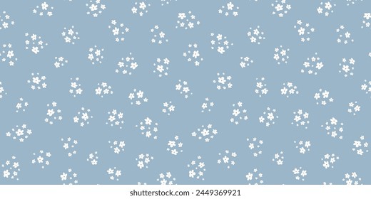 Subtle ditsy pattern. Simple vector blue and white seamless ornament with small flowers. Elegant abstract floral background. Minimalist texture. Repeated design for decor, fabric, wallpaper, print