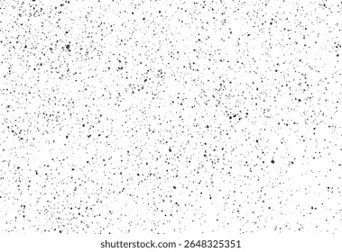 Subtle grunge ink splatter texture with dense fine dots and organic specks. Seamless noise pattern for vintage or artistic background use.
