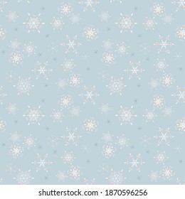 Subtle snowflakes seamless pattern. Elegant vector Christmas and New Year background with snow, snowflakes. Winter holidays theme. Vintage style. Soft blue and white color. Repeat decorative design
