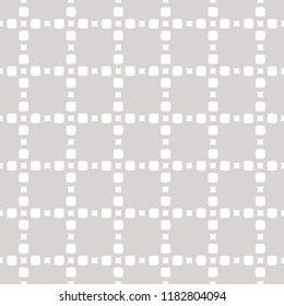Subtle vector minimalist seamless pattern with tiny squares and circles in delicate grid. Simple abstract geometric background texture white and light gray color. Silver ornament. Fine repeat design 