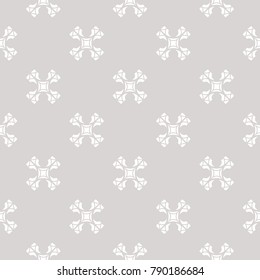 Subtle vector seamless pattern with carved crosses. Delicate background in neutral pastel colors, light gray and white. Vintage style minimalist geometric texture. Design for gift paper, decor, cloth