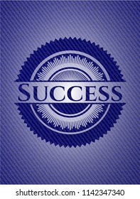 Success badge with denim background