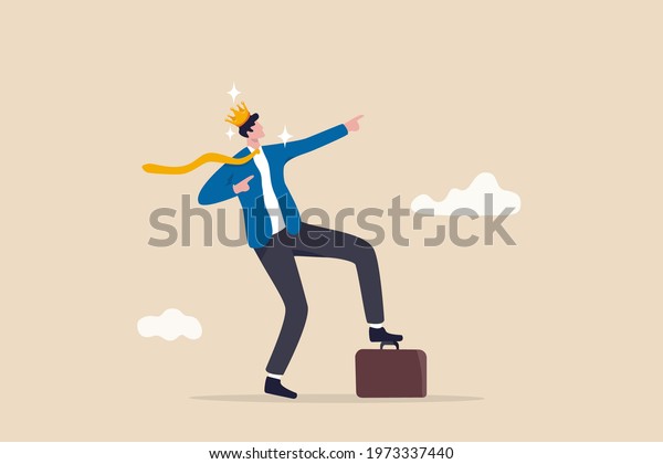 Success businessman king proud of his achievement,\
work happiness or self esteem, freedom or entrepreneurship concept,\
cheerful businessman wearing king crown step on briefcase pointing\
to the sky.