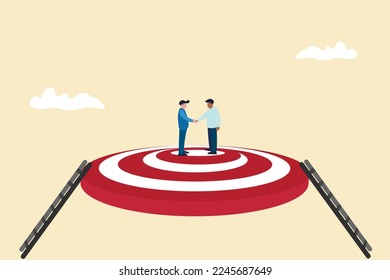 success businessmen finish deal and handshake on target. concept of Collaborate, cooperate or partnership and agreement to help business success, together or teamwork.