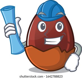 A success of chocolate egg Architect having blue prints and blue helmet