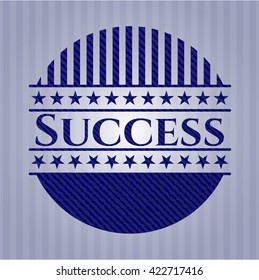 Success emblem with denim texture