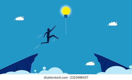 Success in learning new things. man jumping and grabbing a light bulb balloon