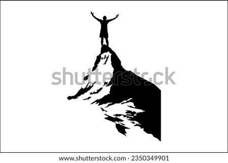 Success: A man stands on top of a mountain and raises his arms because he is happy that he has achieved his goal.
