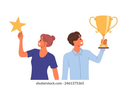 Successful business man and woman have become winners of competition among company managers and holding trophies. Winners hold gold cup and star in hands, symbolizing achievements on career ladder