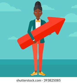 Successful business woman with arrow up.