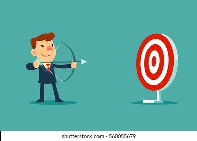 successful businessman aiming target with bow and arrow