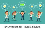 successful businessman charging battery power to his business team