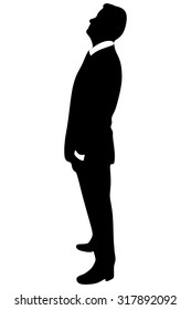 successful businessman looking up 