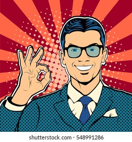 Successful businessman okay gesture OK. Business concept success. Retro style pop art. Vector illustration.