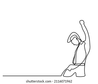 successful businessman raising his fist