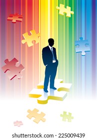 Successful businessman is standing on a piece of jigsaw puzzle