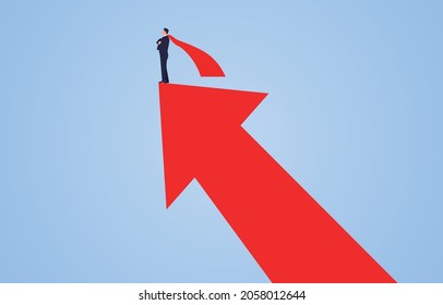 Successful businessman wearing red cape standing on upward growing red arrow.