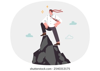 Successful man leader stands on top of cliff with bandage on head and looks confidently into future. Ambitious entrepreneur leader proud of success achieved and opportunity to become best in industry