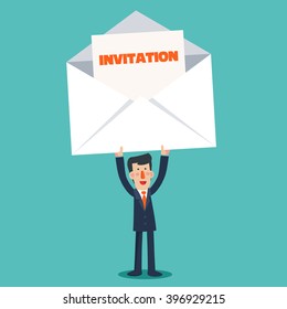 Successful smiling young business man holding a big envelope with a invitation card. Post letter, delivery service or e-mail vector concept 