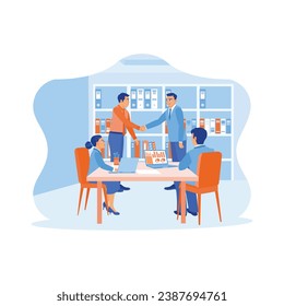Successful teamwork during office meetings. Businessman shaking hands with another colleague after reaching a good agreement. Success and happiness teamwork concept. 