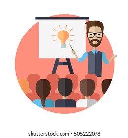 Successful young man with glasses making a presentation near whiteboard with infographics before an audience. Coaching and shows business charts and graphs. Business seminar.