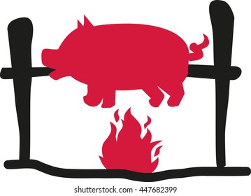 Suckling pig over flame