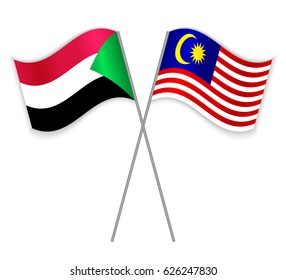 Sudanese and Malaysian crossed flags. Sudan combined with Malaysia isolated on white. Language learning, international business or travel concept.