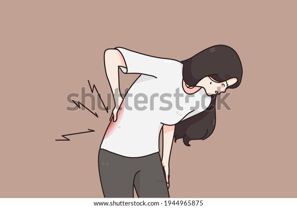 Suffering from Chronic back pain concept. Young woman\
standing holding her lower back suffering from unbearable pain\
vector illustration 