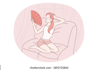 Suffering from heat concept. Young stressed girl cartoon character sitting with hand fan and suffering from incredible heat in room indoors vector illustration 