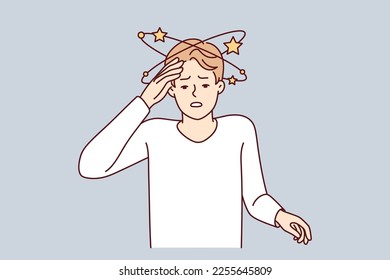 Suffering man experiencing pain in head after severe injury puts hand on forehead. Guy suffers from dizziness or needs to take drugs against intracranial pressure. Flat vector illustration