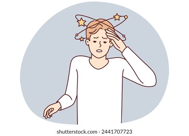 Suffering man experiencing pain in head after severe injury puts hand on forehead. Guy suffers from dizziness or needs to take drugs against intracranial pressure. Flat vector illustration