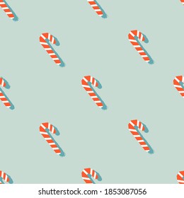Sugar Christmas striped candies seamless pattern. The vintage trendy pattern design. Minimalistic pastel pattern for gift wrap, stationery, textiles, posters, and web use. Winter holiday concept.